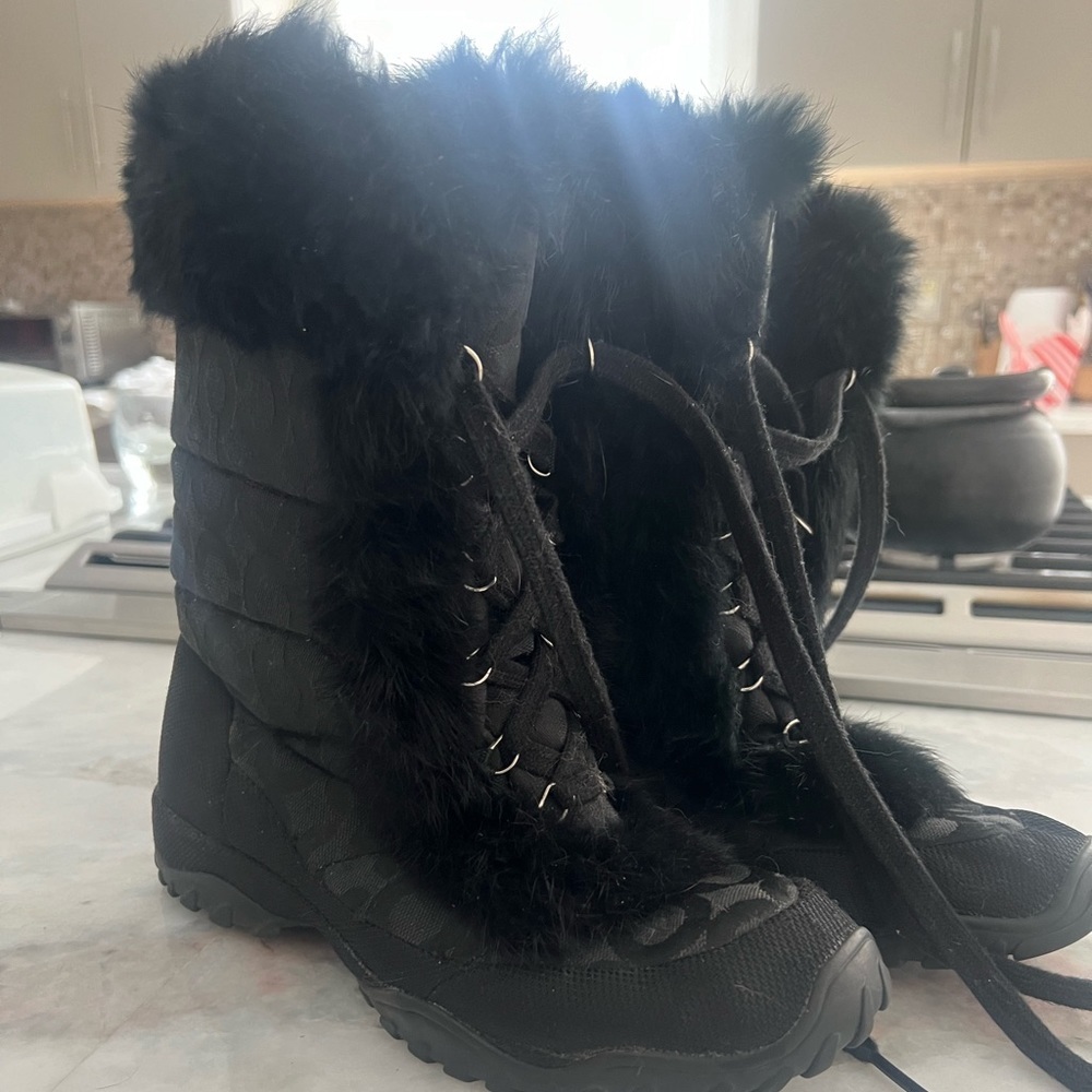 Rabbit fur lined coach booties.